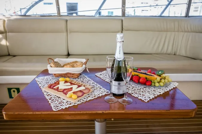 Neptuno yacht interior with drinks and food